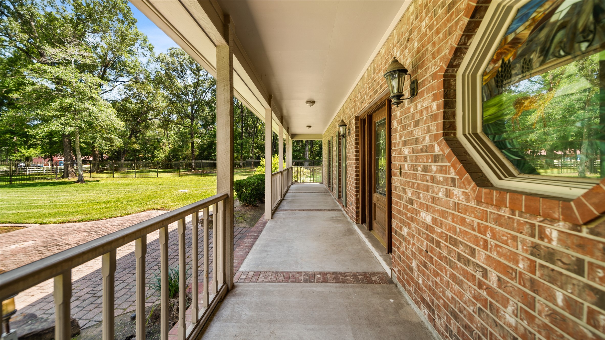 29803 Huffman Cleveland Road Huffman, TX 77336 - Photo 9 of 49 a view of a balcony with yard