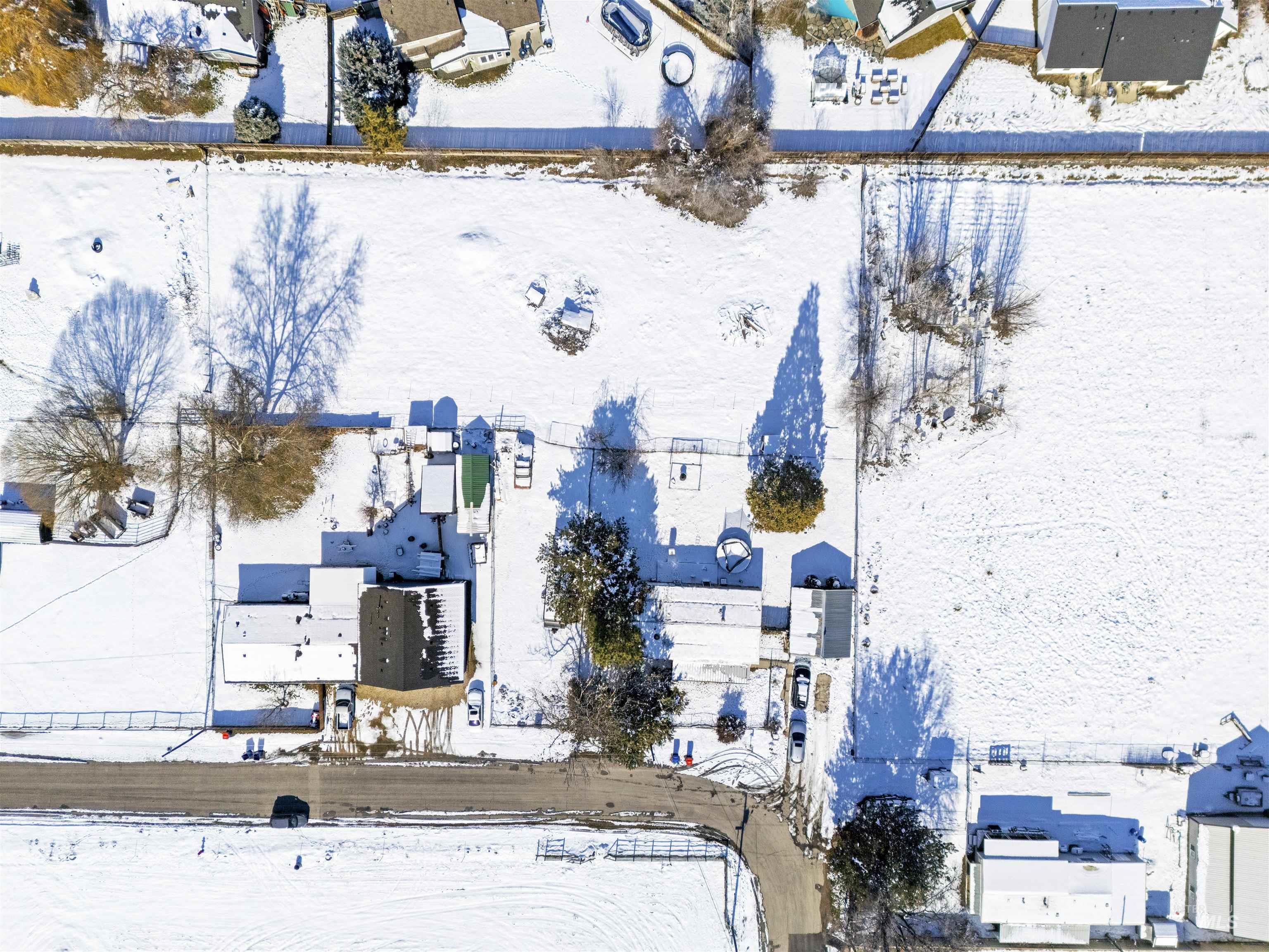2382 East Syringa Street Eagle, ID 83616 - Photo 2 of 25 Snowy aerial view featuring a residential view