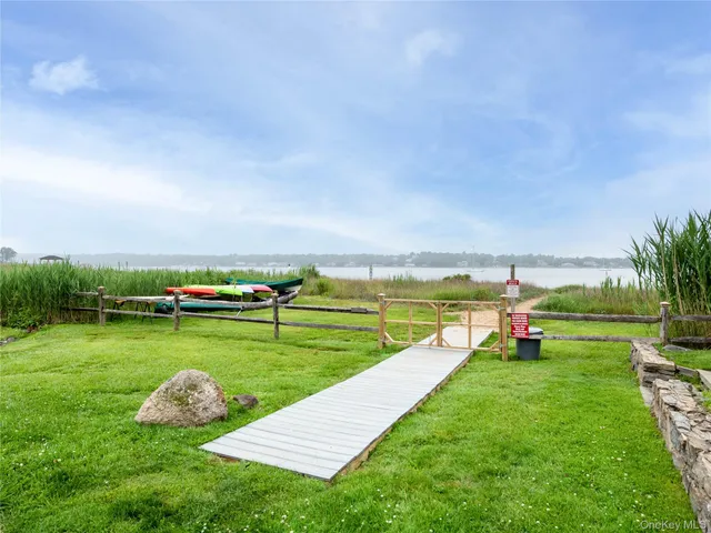 a view of a park with houses