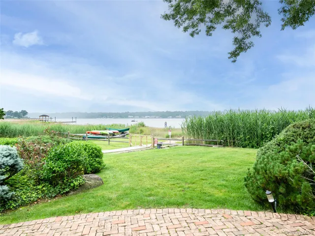 a view of a golf course with a lake