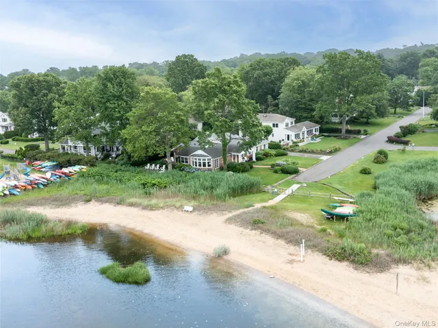 a view of a street with a yard