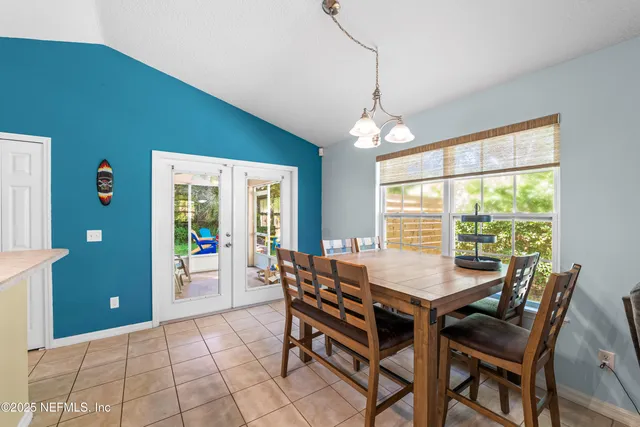 a kitchen with a sink and stove