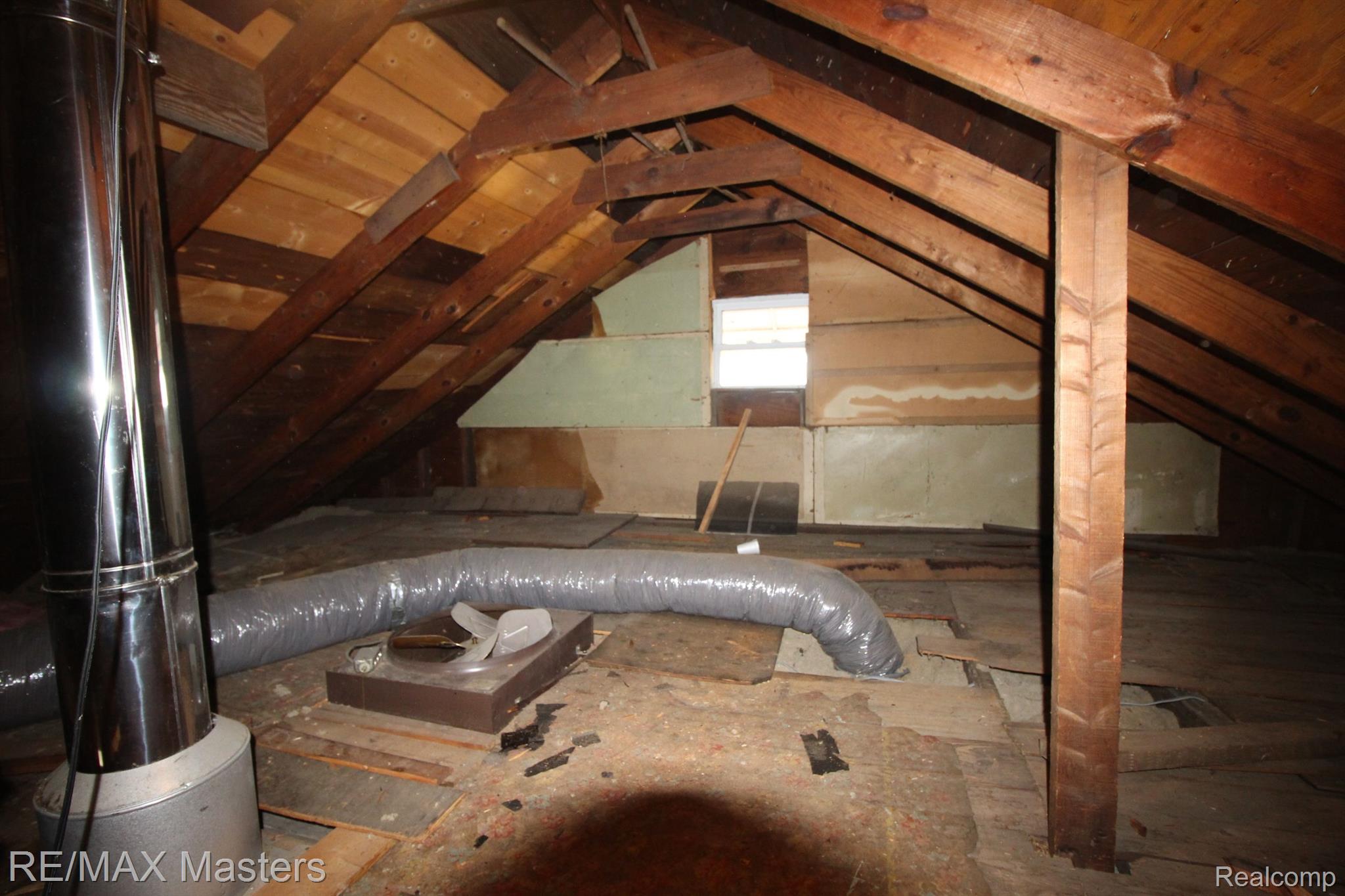 12527 Sumpter Road Carleton, MI 48117 - Photo 28 of 33 Plenty of storage in your walk-up attic.