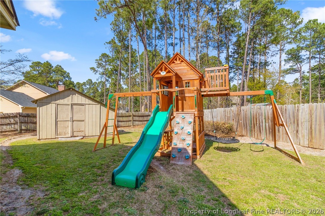 7756 Dragonhead Road Fayetteville, NC 28311 - Photo 37 of 42 a view of a house with a park