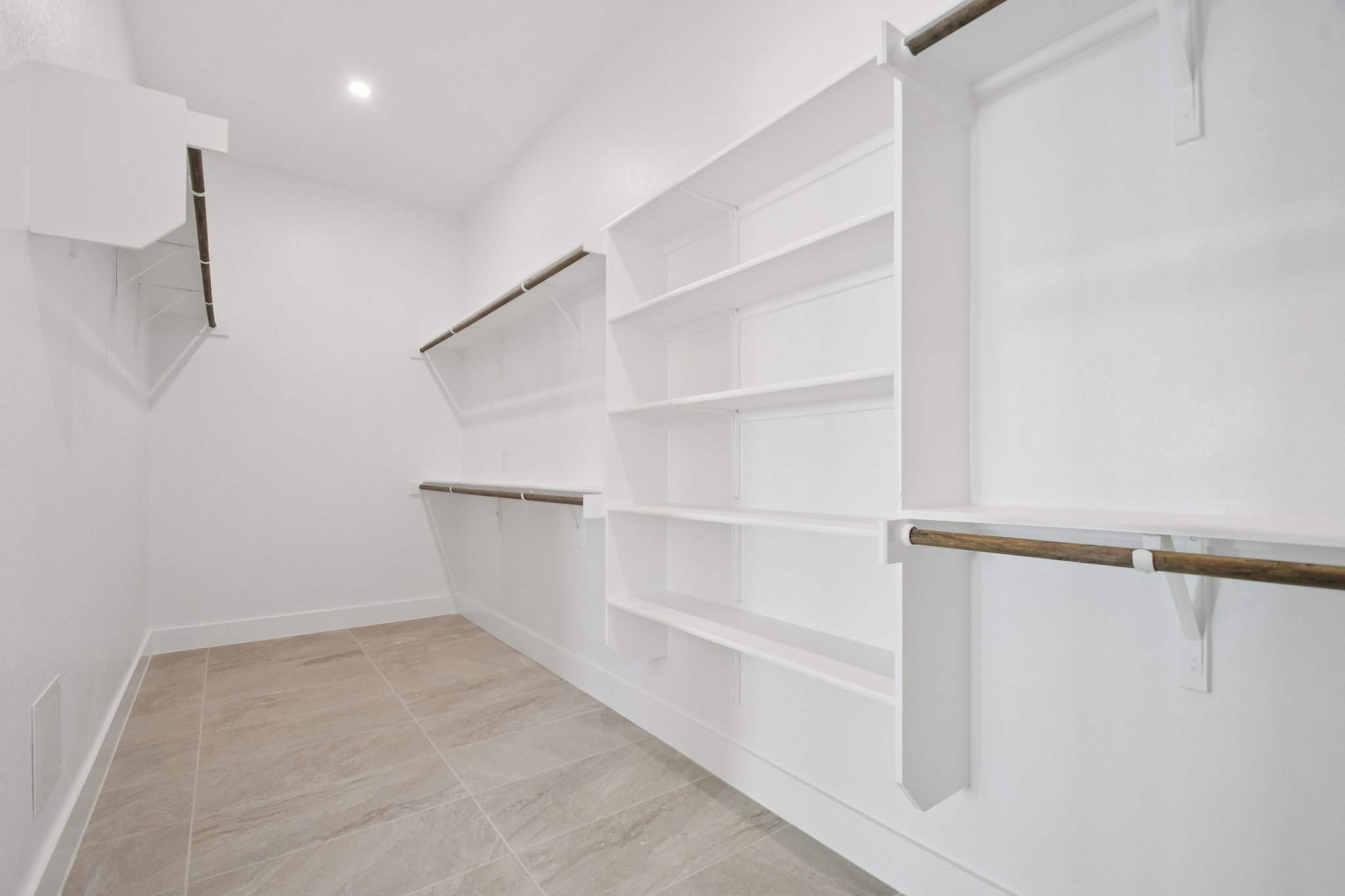 1660 Cardinal Lane Round Rock, TX 78681 - Photo 24 of 35 a view of an empty walk in closet