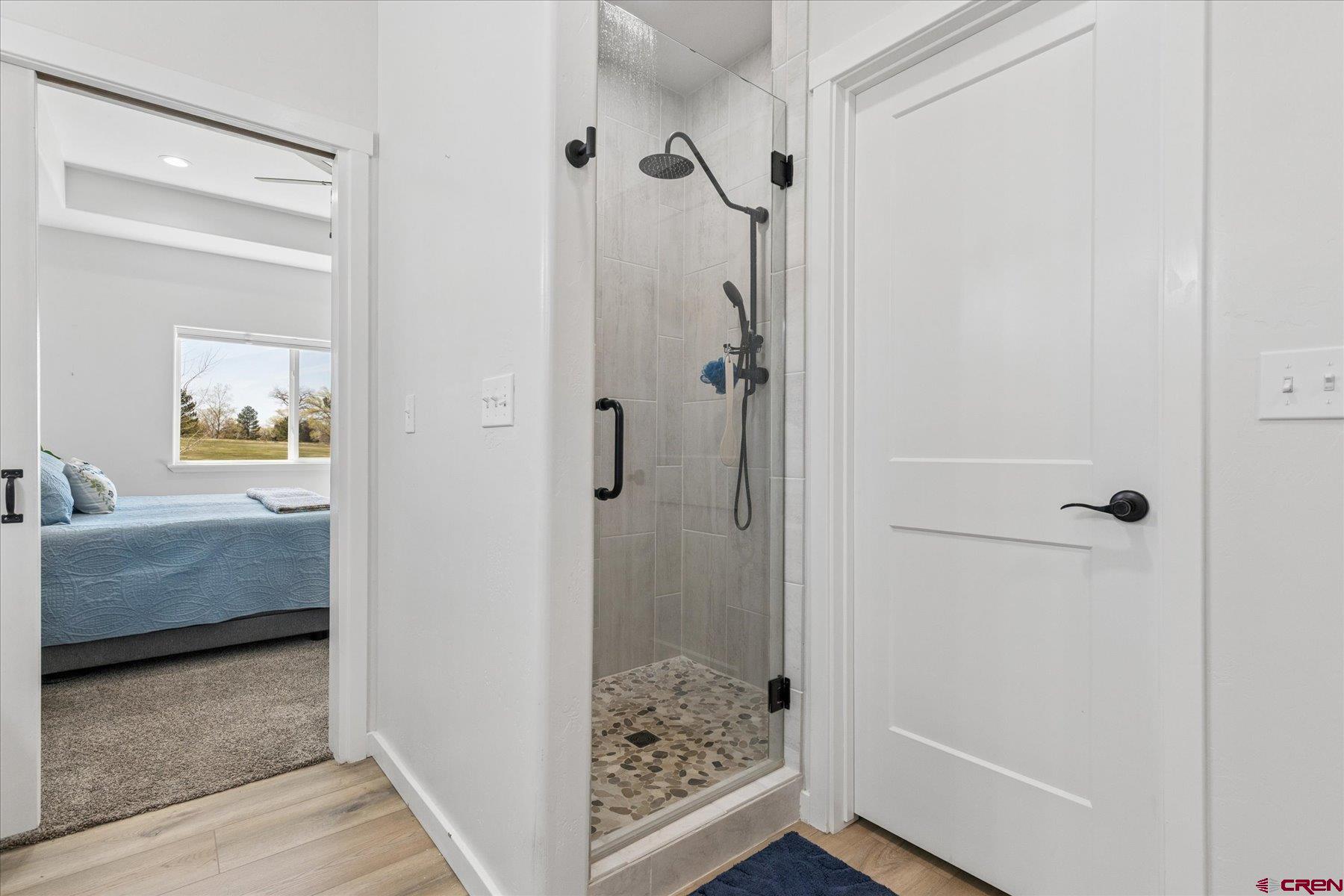 1937 Golf Course Lane Cortez, CO 81321 - Photo 21 of 31 a bathroom with a shower