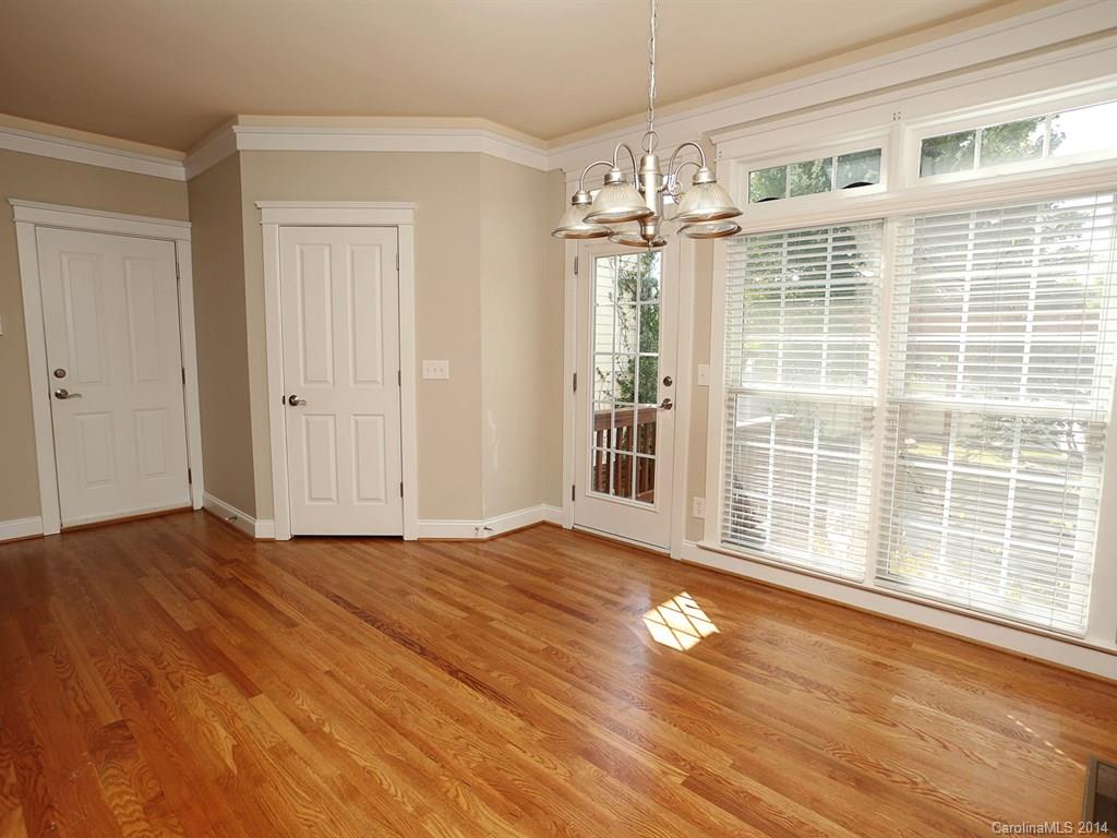 329 Third Baxter Street Fort Mill, SC 29708 - Photo 15 of 23 a view of empty room with wooden floor and fan