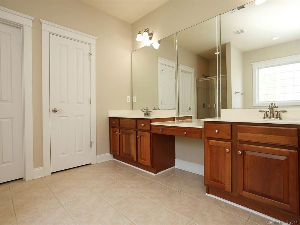 329 Third Baxter Street Fort Mill, SC 29708 - Photo 18 of 23 a bathroom with a sink double vanity and a mirror