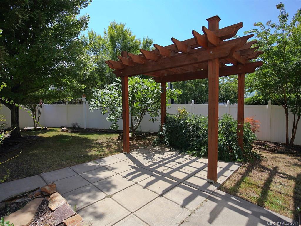 329 Third Baxter Street Fort Mill, SC 29708 - Photo 22 of 23 a view of backyard with plants and outdoor seating