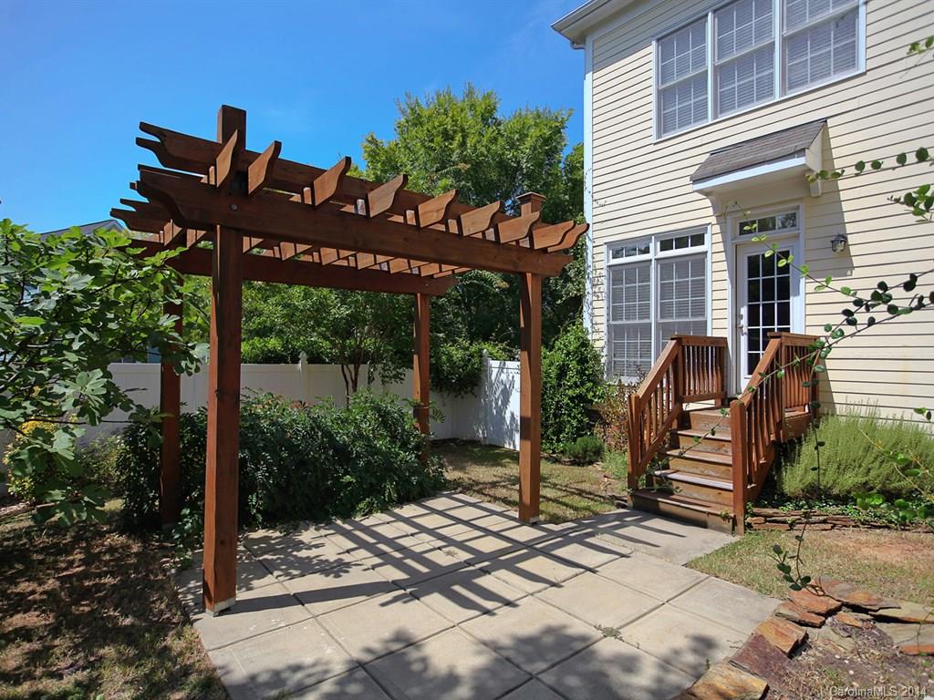 329 Third Baxter Street Fort Mill, SC 29708 - Photo 23 of 23 a view of a chairs and table in the patio