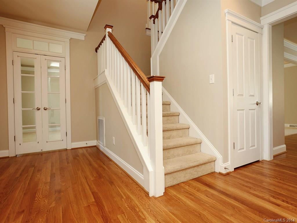 329 Third Baxter Street Fort Mill, SC 29708 - Photo 4 of 23 a view of entryway with wooden floor and stairs