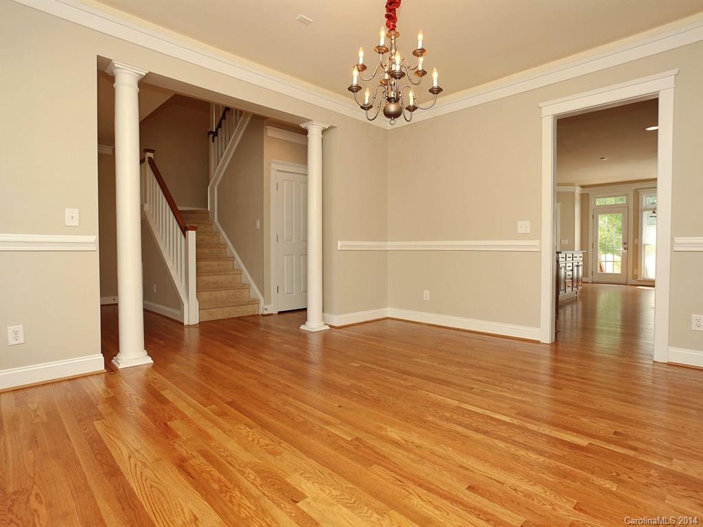 329 Third Baxter Street Fort Mill, SC 29708 - Photo 6 of 23 a view of empty room with wooden floor and fan
