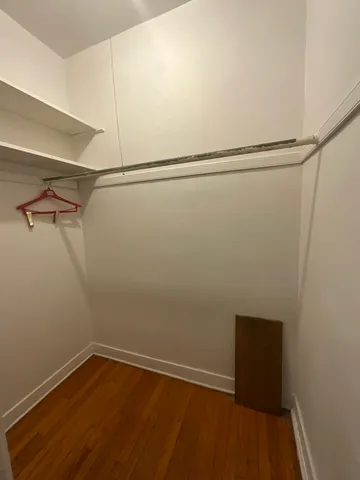 a view of a room with racks on the wall