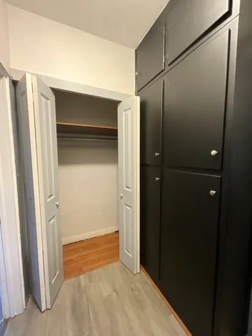 a view of entryway with wooden floor