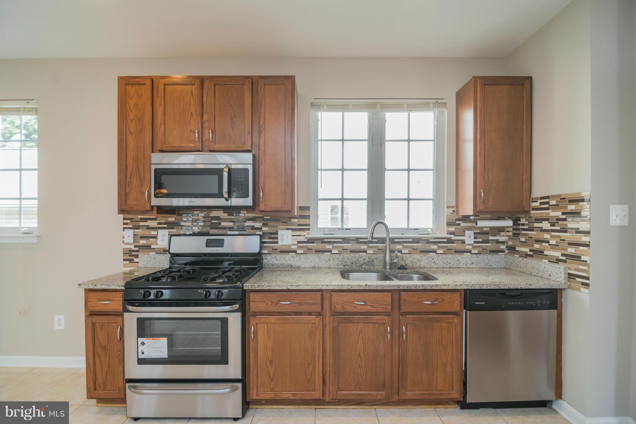 18110 Coachmans Road Germantown, MD 20874 - Photo 13 of 30 Kitchen