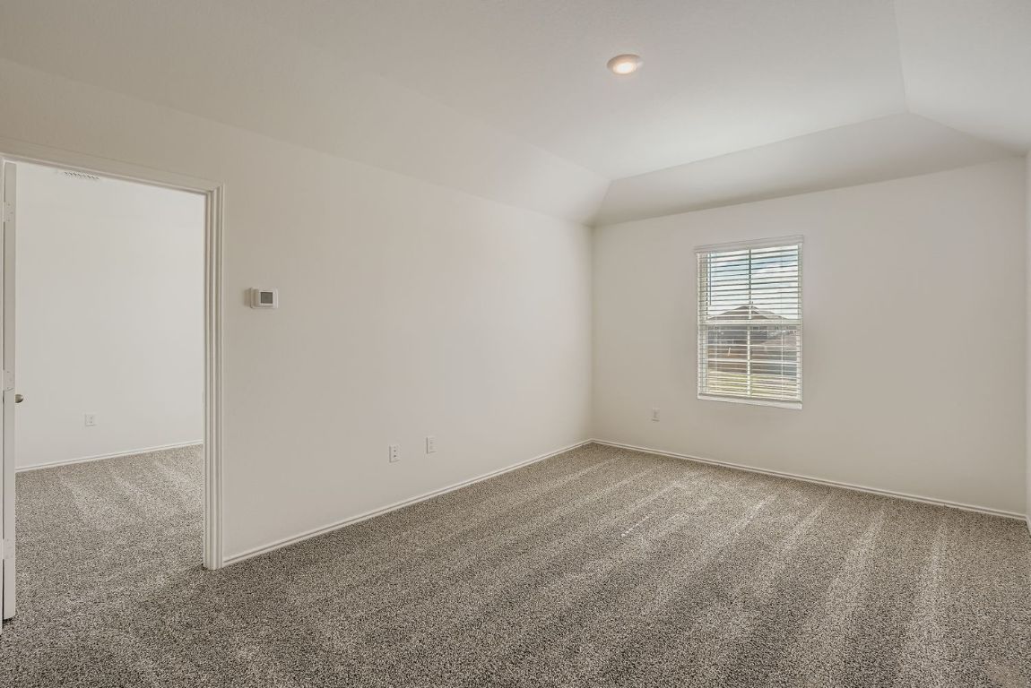 12112 Douglas Fir Circle Mustang Ridge, TX 78610 - Photo 29 of 33 an empty room with a window