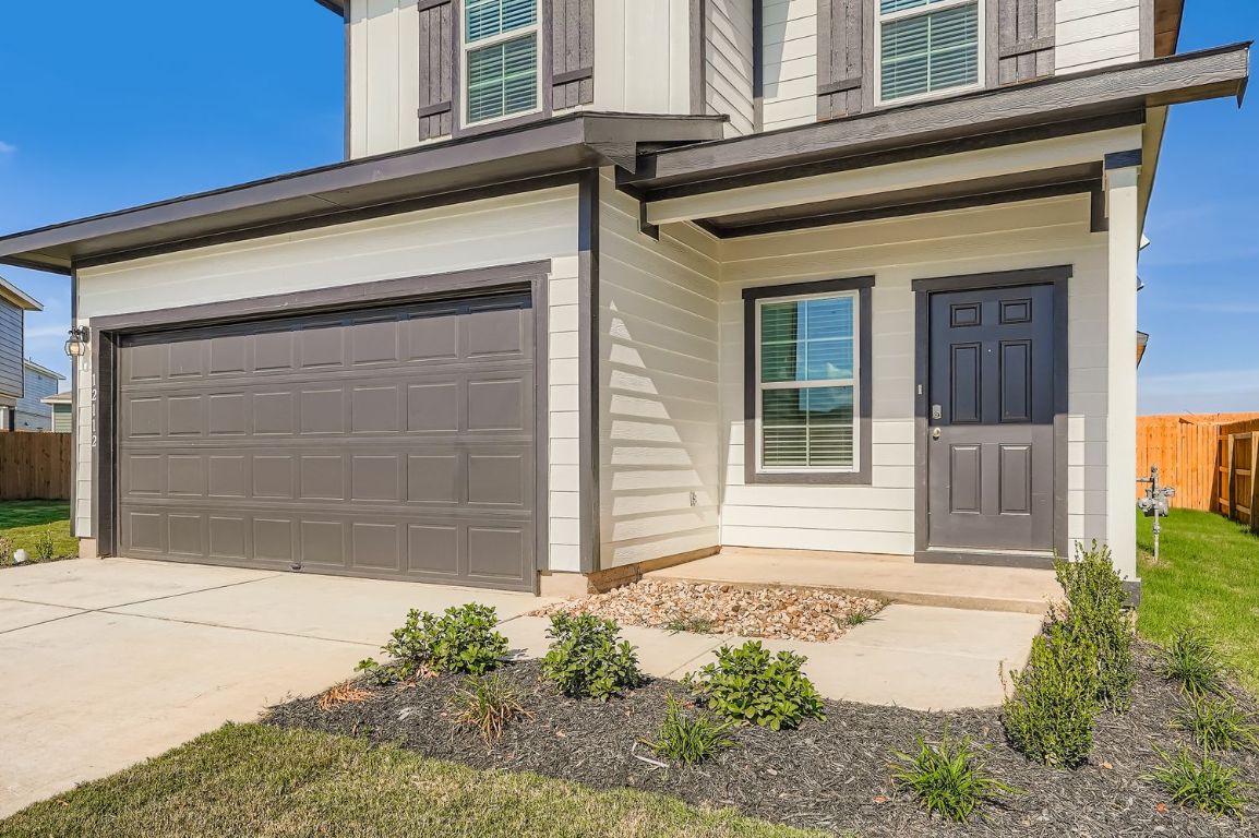 12112 Douglas Fir Circle Mustang Ridge, TX 78610 - Photo 3 of 33 front view of a house
