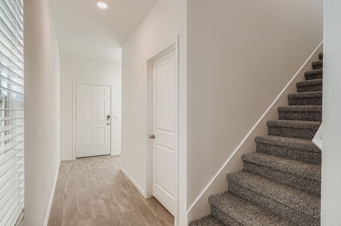 12112 Douglas Fir Circle Mustang Ridge, TX 78610 - Photo 4 of 33 a view of entryway