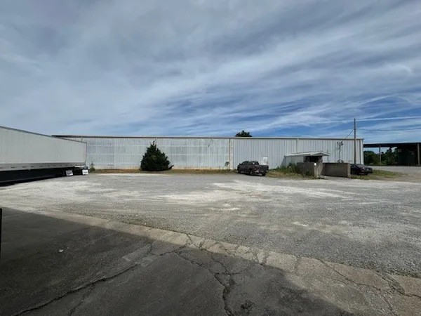 a view of a road with a yard