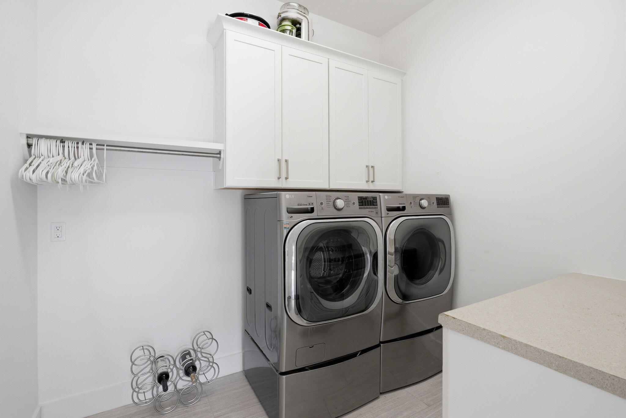 133 Sandchase Circle, Unit LOT 15 Inlet Beach, FL 32461 - Photo 12 of 47 a utility room with dryer and washer