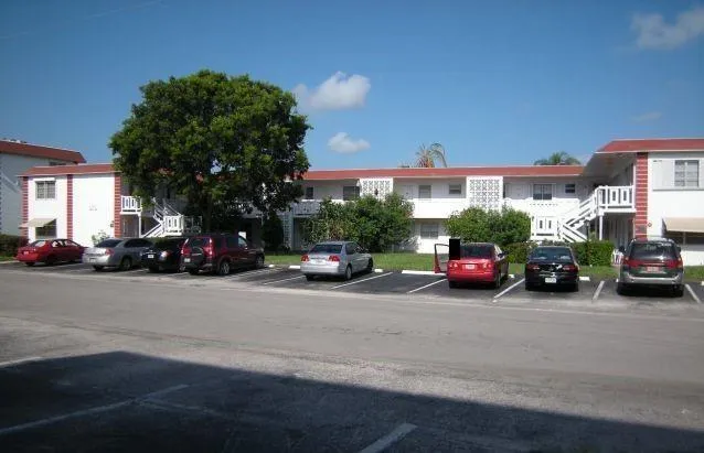 a view of a cars parked in front of a building