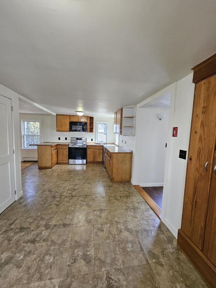 119 Bradley Road Milford, ME 04461 - Photo 11 of 54 #11 Kitchen from dining area b