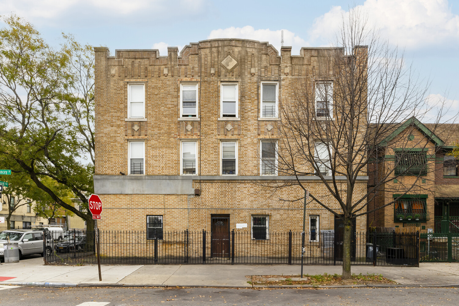 a view of a building with a street