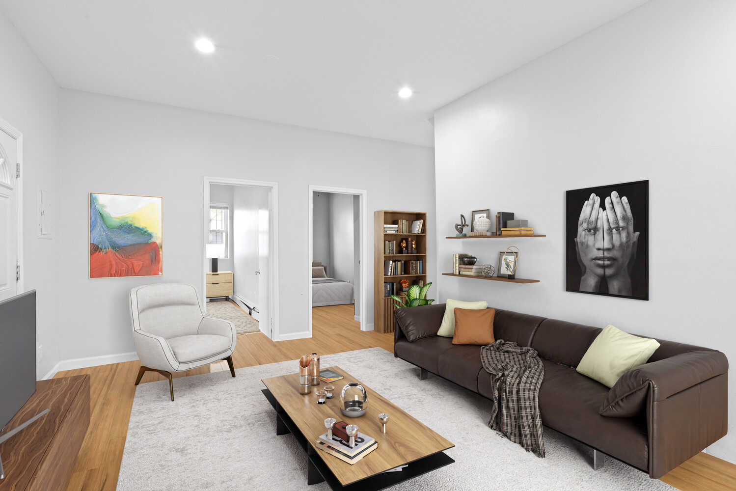 316 Chauncey Street, Unit MULTIFAM Brooklyn, NY 11233 - Photo 2 of 5 a living room with furniture and a couch