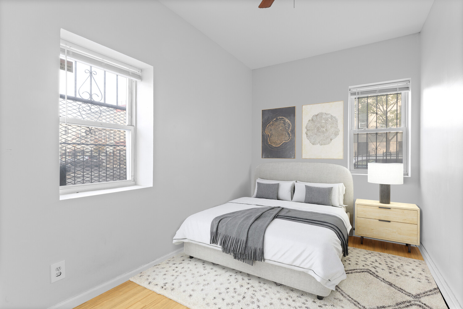 316 Chauncey Street, Unit MULTIFAM Brooklyn, NY 11233 - Photo 4 of 5 a bedroom with a bed and a window