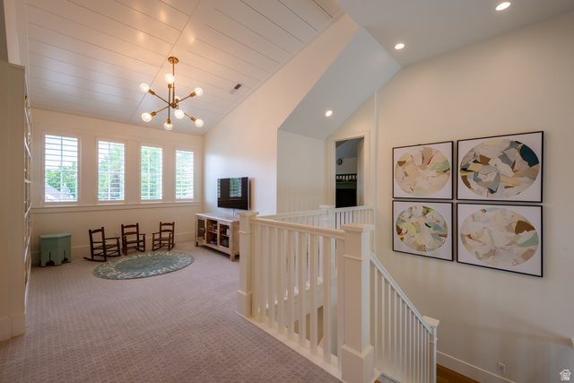 630 East Center Street Alpine, UT 84004 - Photo 49 of 115 Upper-level landing featuring vaulted ceilings with shiplap detailing, recessed lighting, and a contemporary brass chandelier
