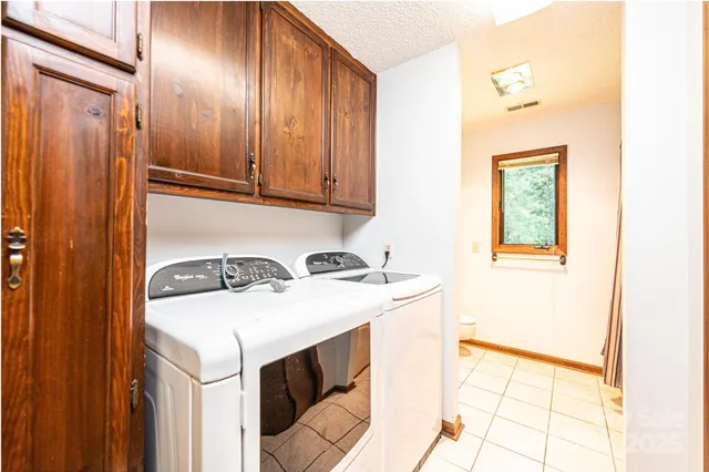a bathroom with a toilet a sink and a mirror