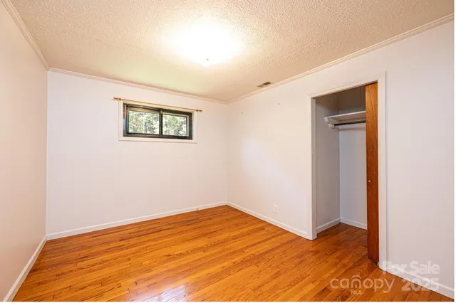 a view of a big room with wooden floor