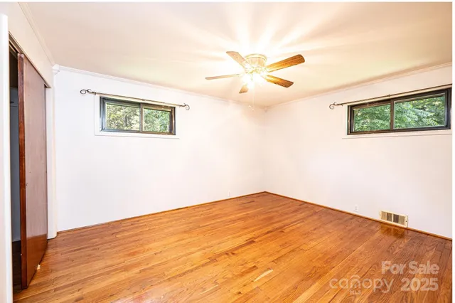 a view of a storage room with wooden walls