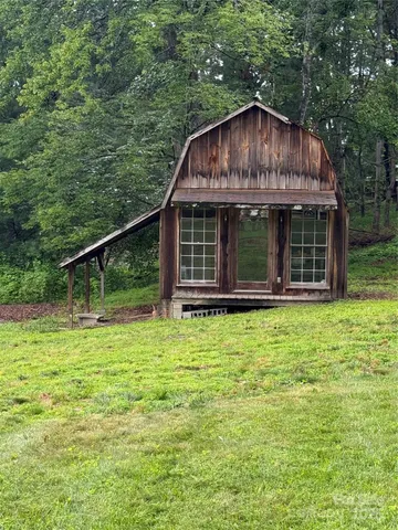 a room with a table and chairs