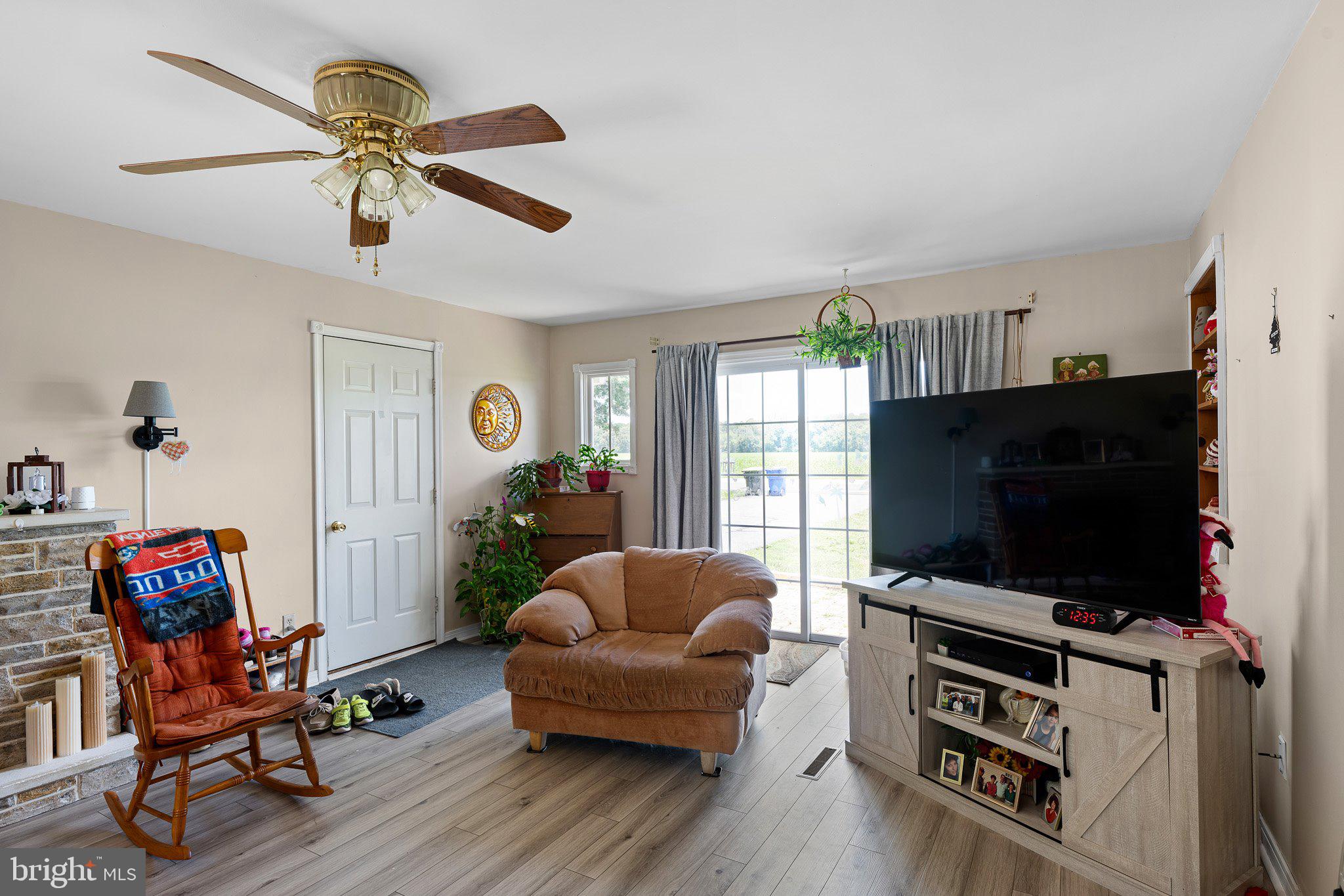 3302 Barratts Chapel Road Frederica, DE 19946 - Photo 15 of 19 a living room with furniture and a flat screen tv