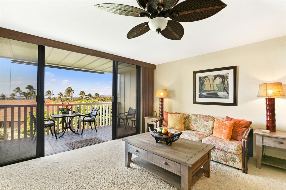 1870 Hoone Road, Unit 802 Koloa, HI 96756 - Photo 11 of 24 a living room with furniture and a wooden floor