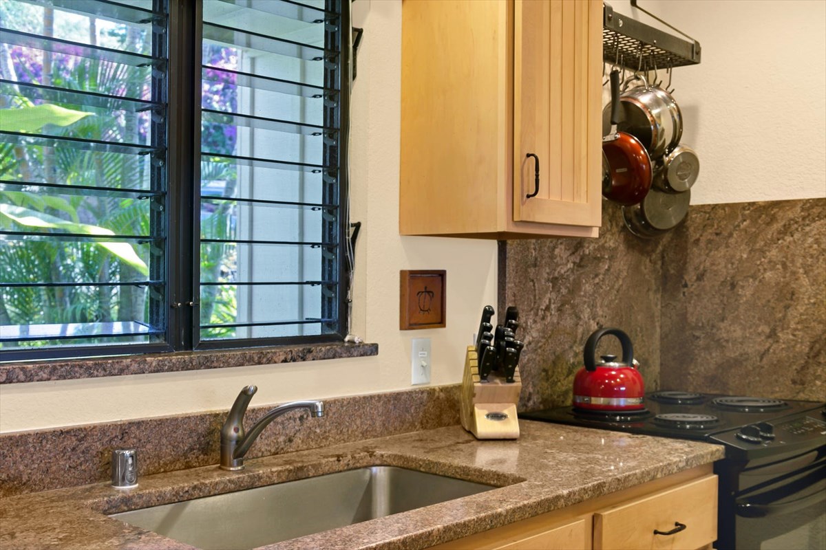 1870 Hoone Road, Unit 802 Koloa, HI 96756 - Photo 13 of 24 a kitchen view of a sink and a window