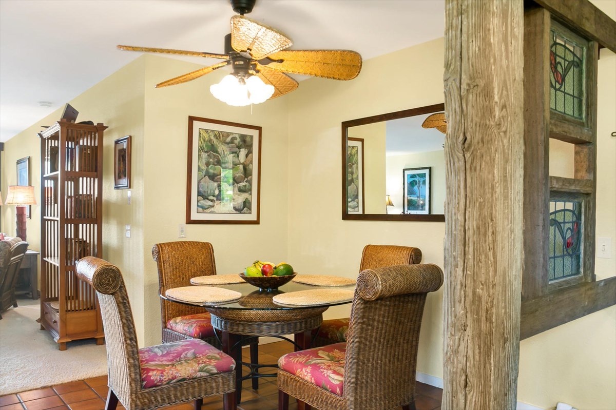 1870 Hoone Road, Unit 802 Koloa, HI 96756 - Photo 15 of 24 a view of a dining room with furniture and chandelier