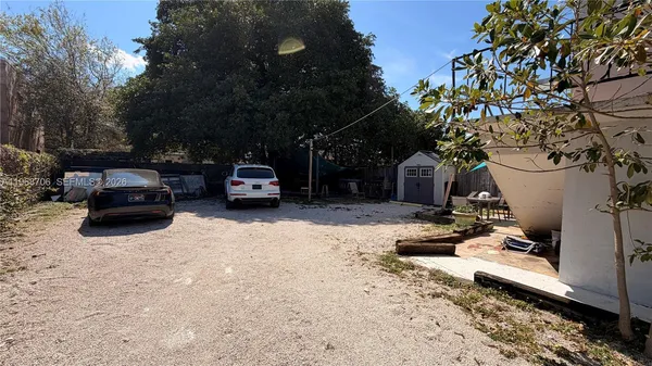 a car parked in front of a house
