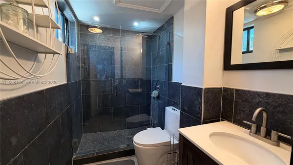 a bathroom with a sink and a toilet