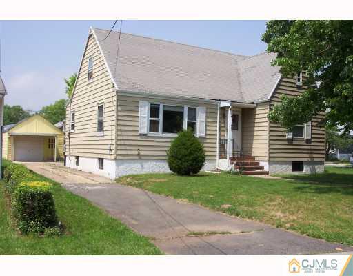 921 King Georges Post Road Edison, NJ 08837 - Photo 1 of 8 a view of a house with a yard and sitting area