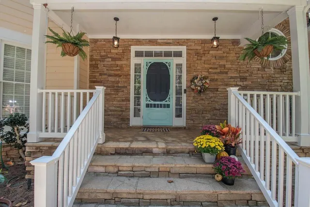 a view of entryway with wooden floor