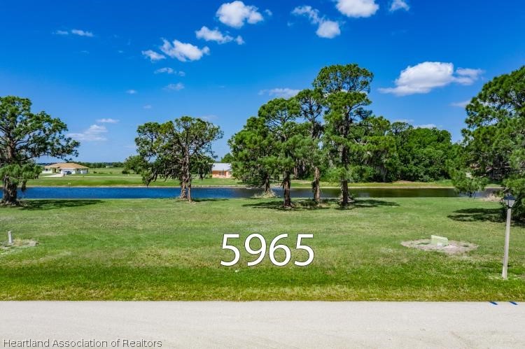 5949 Thunder Road Sebring, FL 33876 - Photo 12 of 25 a view of a park with welcome board