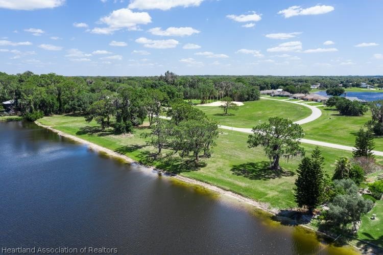 5949 Thunder Road Sebring, FL 33876 - Photo 16 of 25 a view of a garden with houses