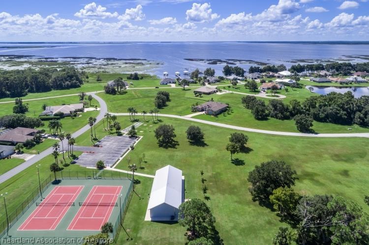 5949 Thunder Road Sebring, FL 33876 - Photo 18 of 25 a view of a lush green field