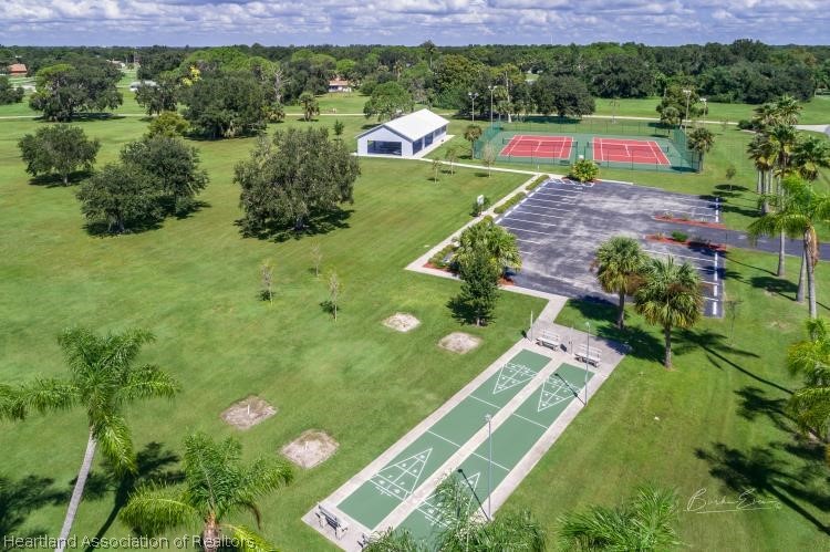 5949 Thunder Road Sebring, FL 33876 - Photo 20 of 25 a view of swimming pool with a yard