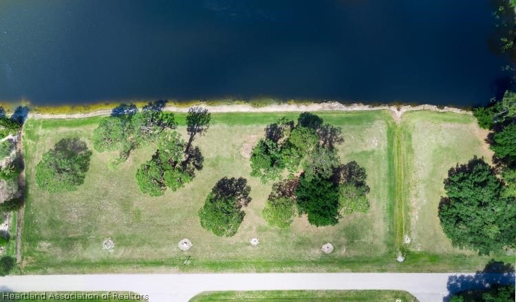 5949 Thunder Road Sebring, FL 33876 - Photo 2 of 25 a view of a garden