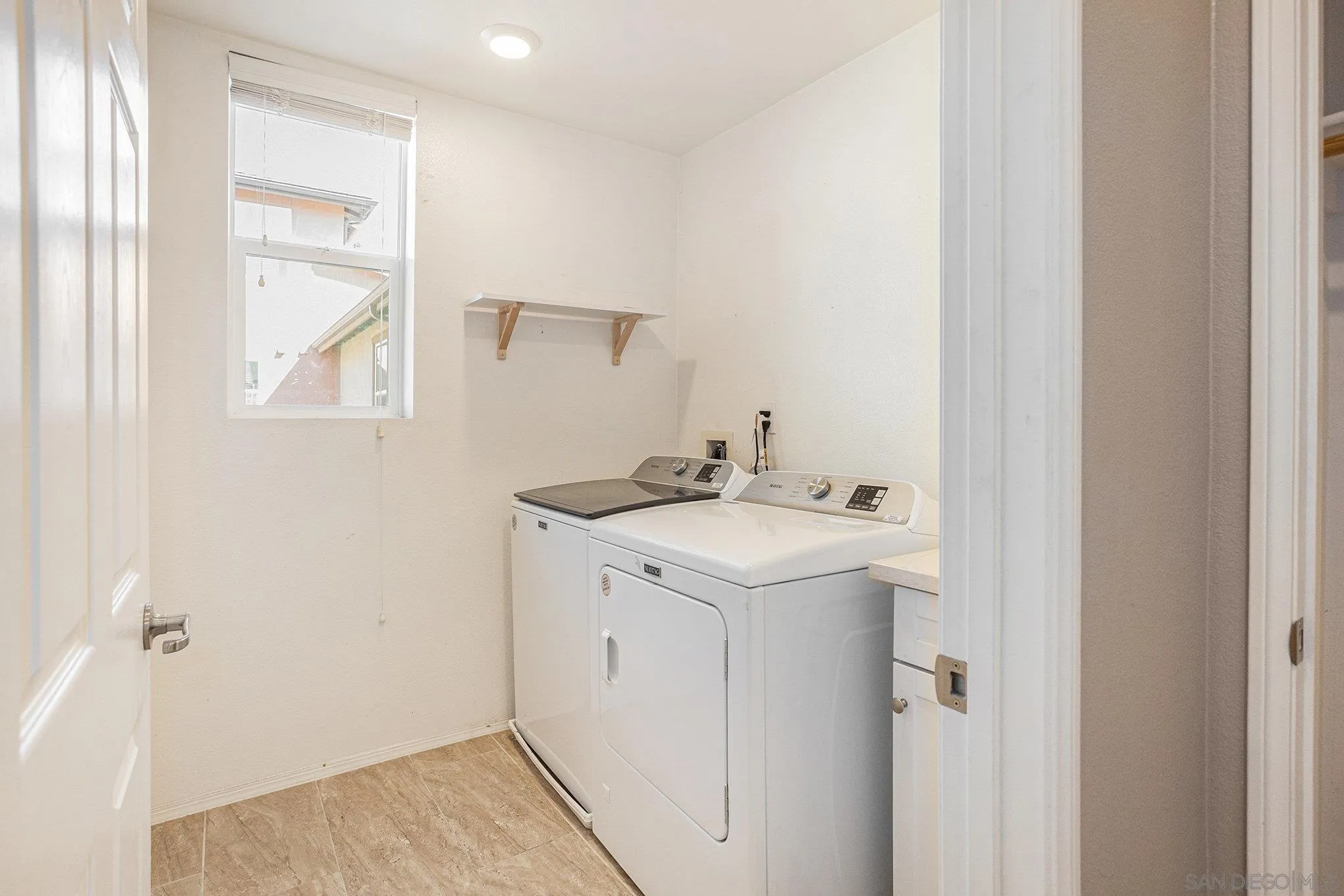 2840 Athens Road, Unit 10 Chula Vista, CA 91915 - Photo 11 of 56 a utility room with a sink dryer and washer