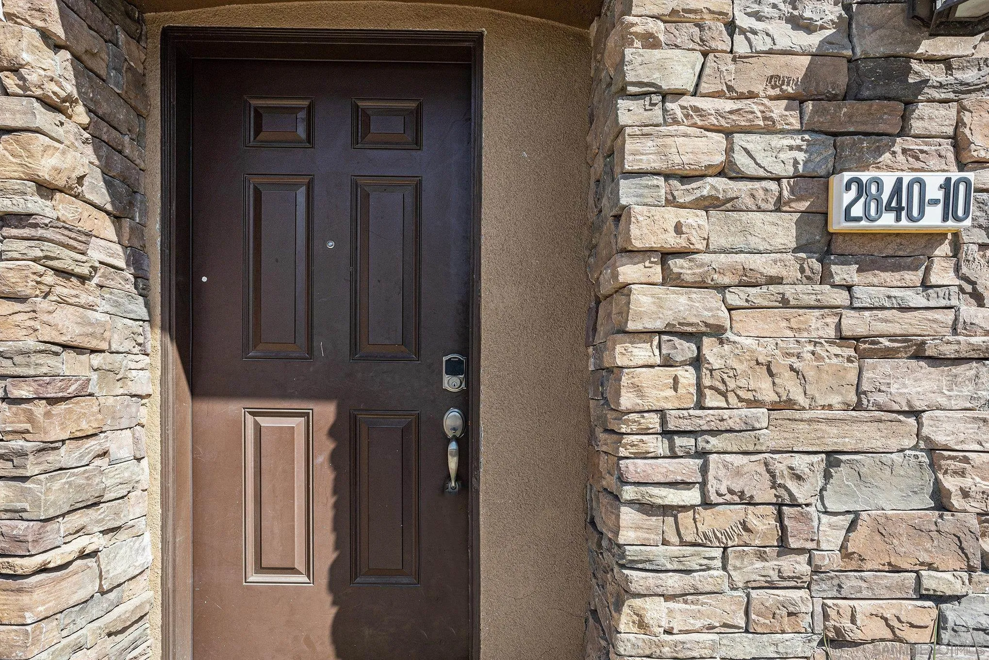 2840 Athens Road, Unit 10 Chula Vista, CA 91915 - Photo 2 of 56 a door with a wooden door