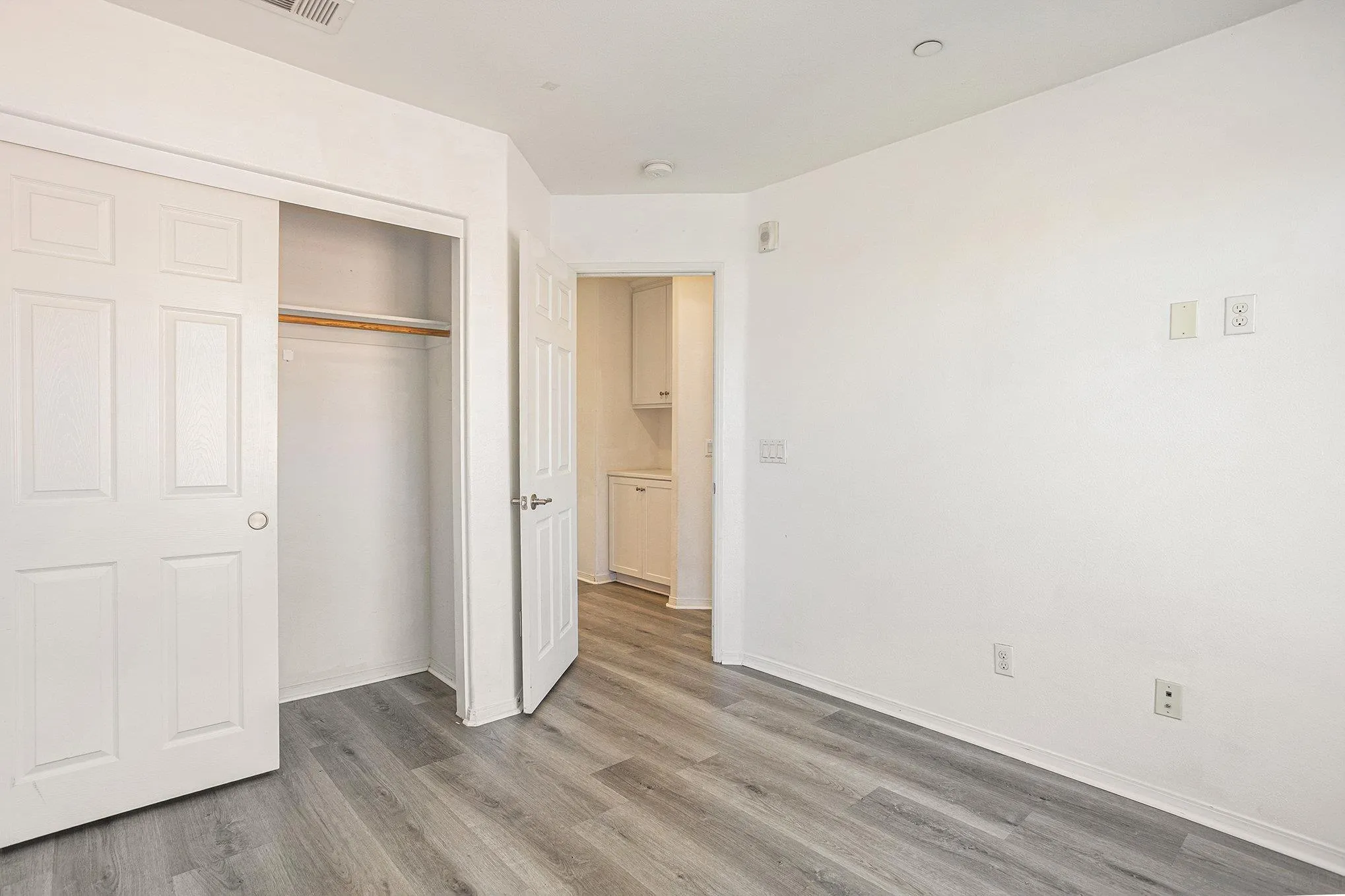 2840 Athens Road, Unit 10 Chula Vista, CA 91915 - Photo 32 of 56 an empty room with wooden floor